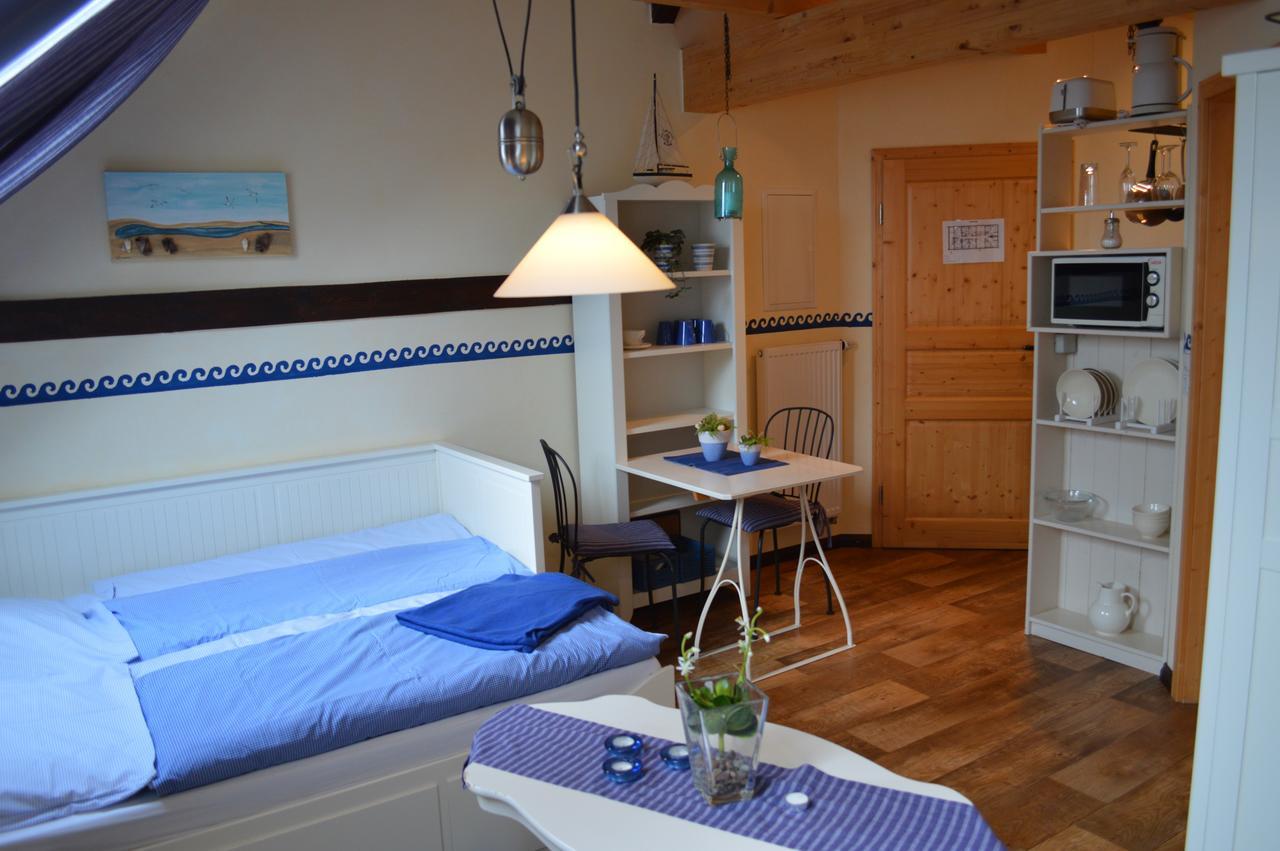 Land & Stil Aparthotel Dorfhagen Kamer foto